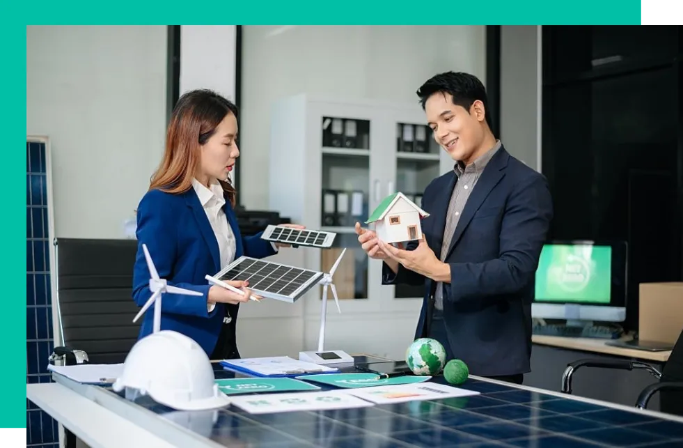 Happy homeowners discussing clean-energy savings
